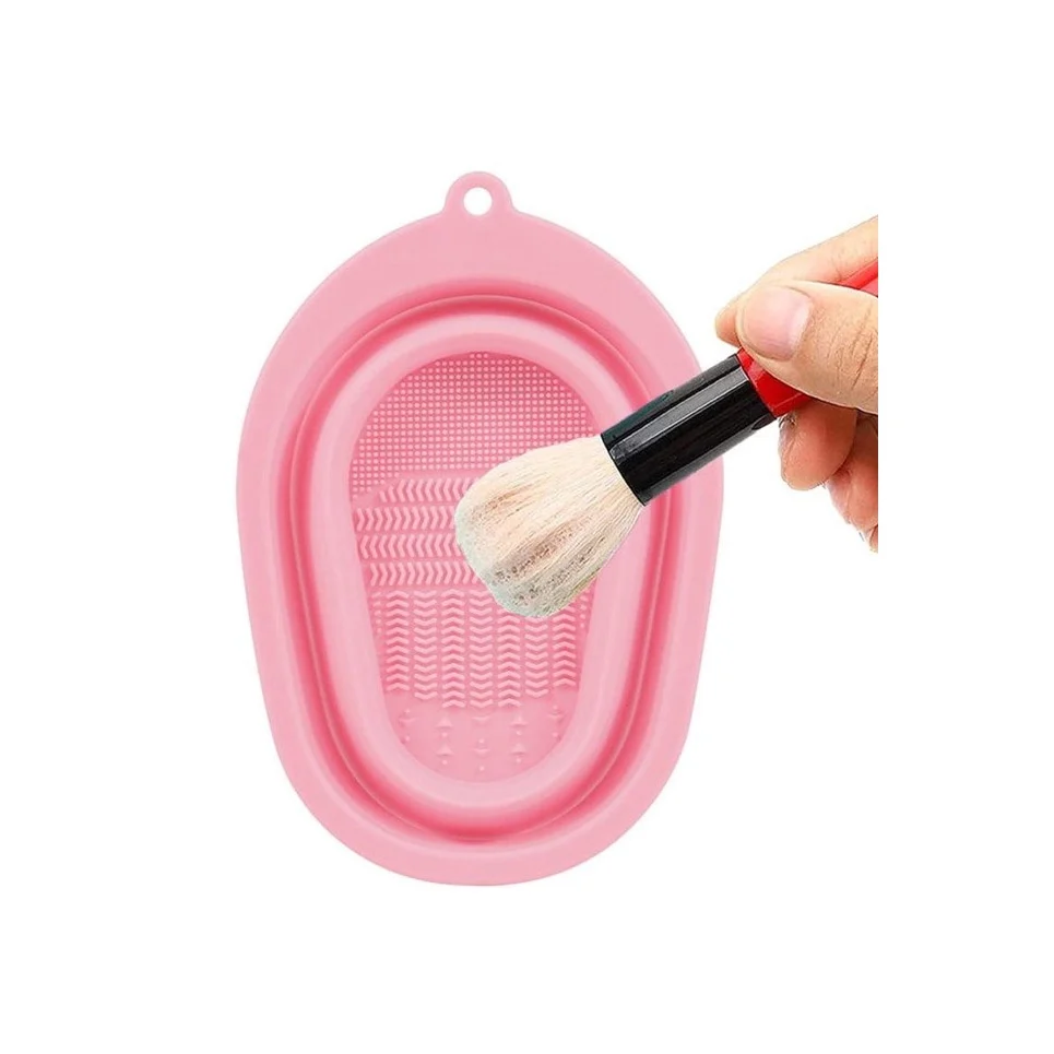 Dispozitiv manual de curatare pensule de machiaj BrushCleaner Basin Doty®, din silicon, cu 4 tipuri de striatii, tip cadita, portabil, pliabil, 15x10, roz pudra